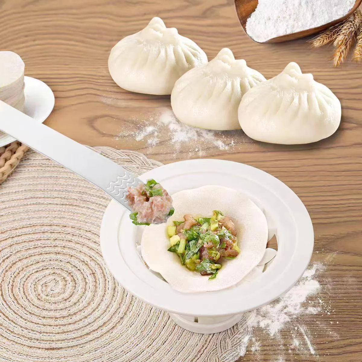 Set of four black Jinkali steamed bun and dumpling moulds on a kitchen counter