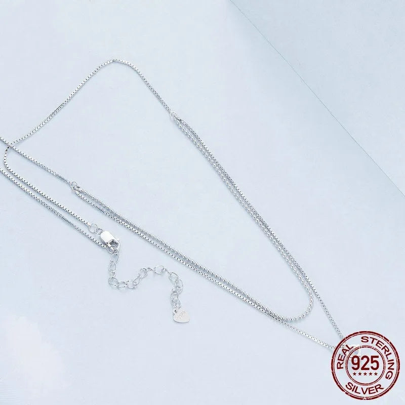 Sterling silver necklace with double-layer pendant and pearl chain style