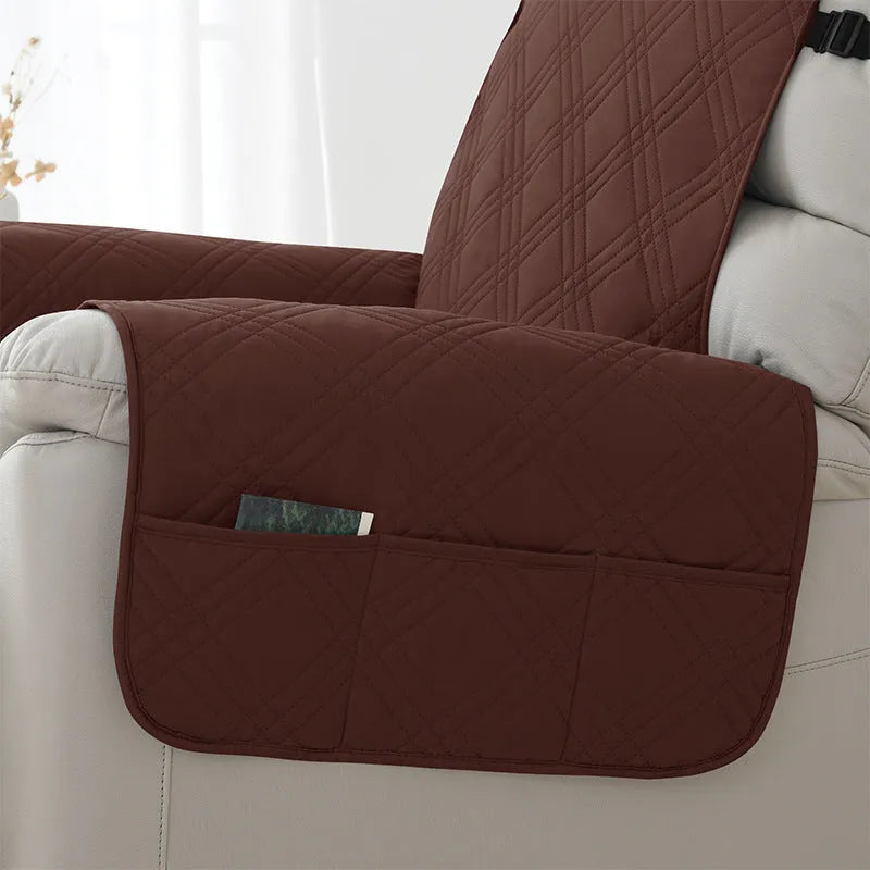 Quilted waterproof sofa cover in burgundy on a single seat massage chair