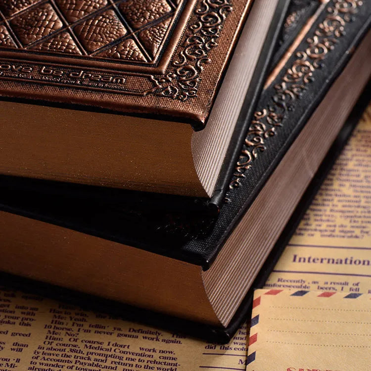 Embossed faux leather notepad with three-dimensional textured cover in bronze colour option