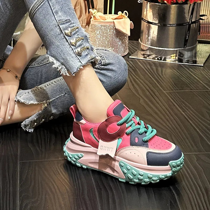 Men's leather casual shoes with thick rubber sole and wedge heel in lace-up design.