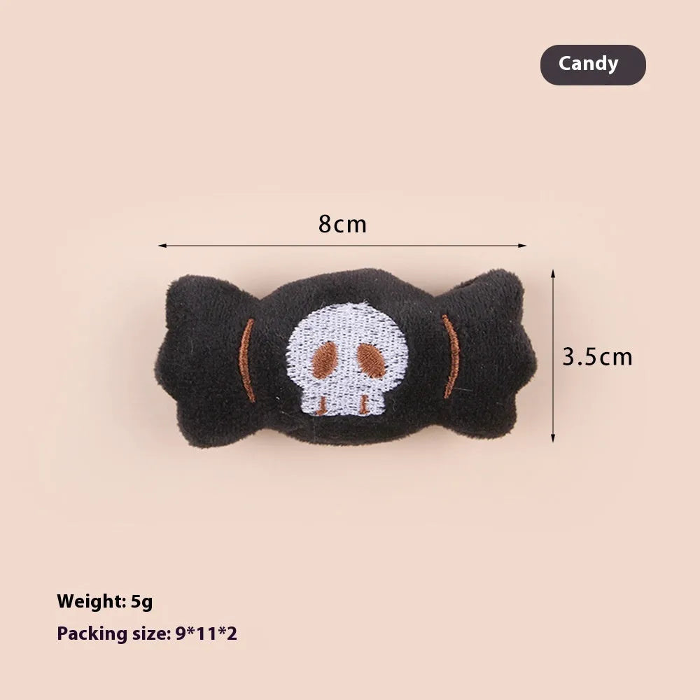 Small plush cat teaser toy with feather wand attachment in candy design