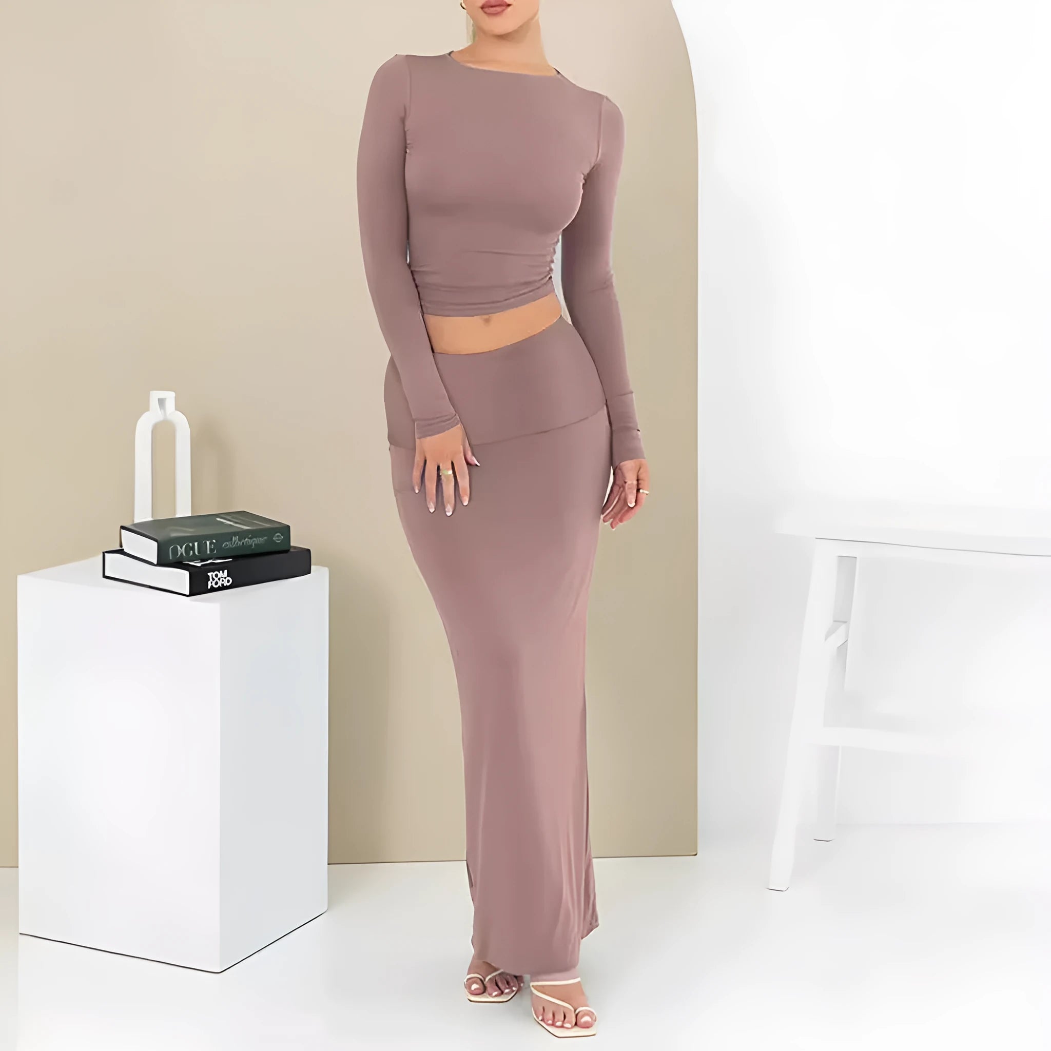 Women's autumn two-piece suit in sweet style, showing three-quarter sleeve top and long skirt.