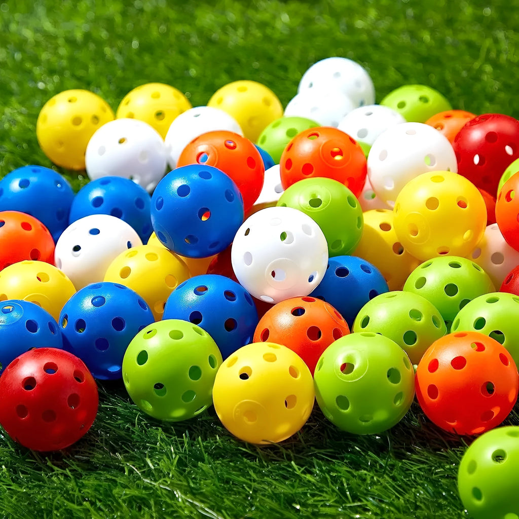 Multi-colour golf practice balls in red, orange, blue, green, white and yellow with net packaging