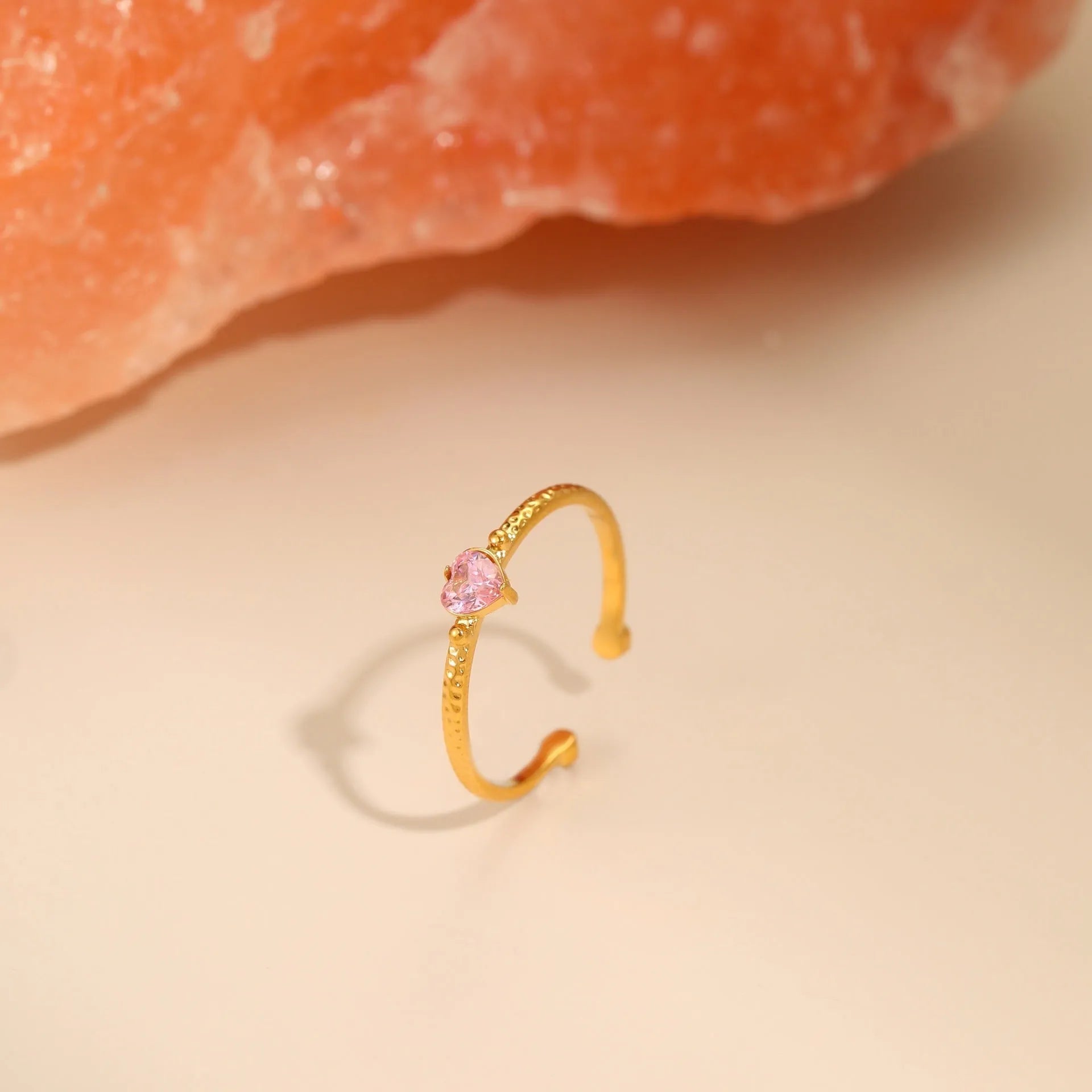 Open-ended stainless steel ring with geometric heart shape and inlaid zircon stones