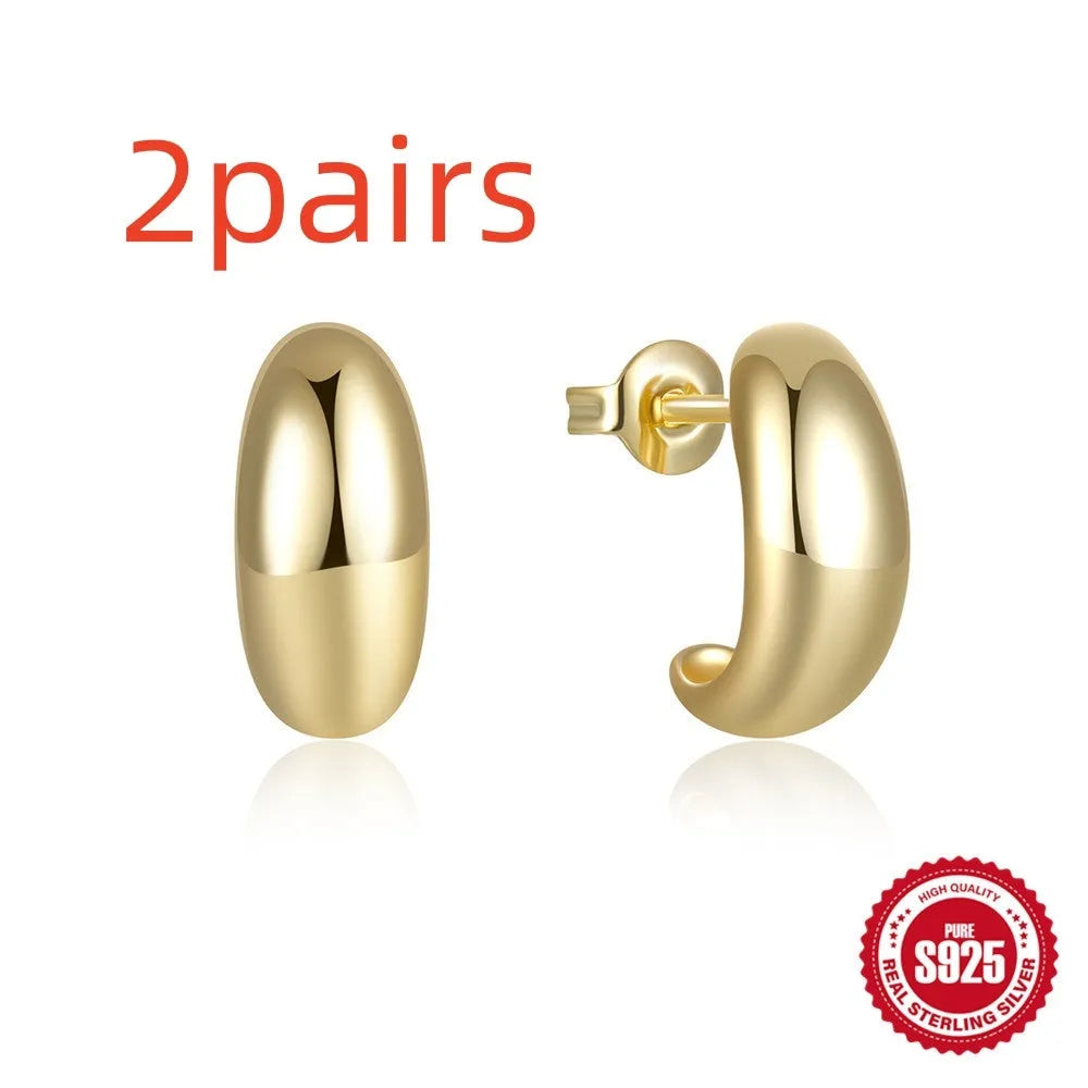 Sterling silver C-shaped stud earring with glossy electroplated finish in geometric design