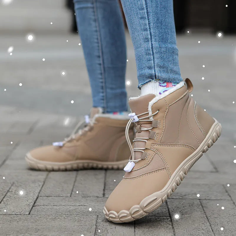 Pair of front lace-up snow boots with round toe, showing black umbrella cloth upper and rubber sole.