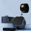 Orange and gray adjustable chest expander and rowing machine fitness equipment for home workouts.