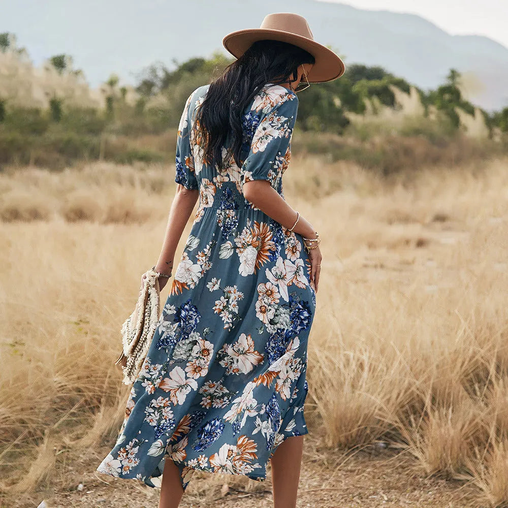 Yellow floral print women's summer dress with V-neck, short sleeves, and elasticated waist.