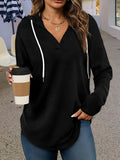 Red women's V-neck sweatshirt with a hood and long sleeves laid flat.