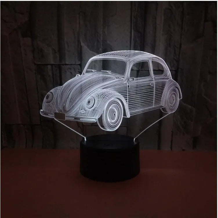 Black LED table lamp with colourful acrylic shade and remote control on wooden desk