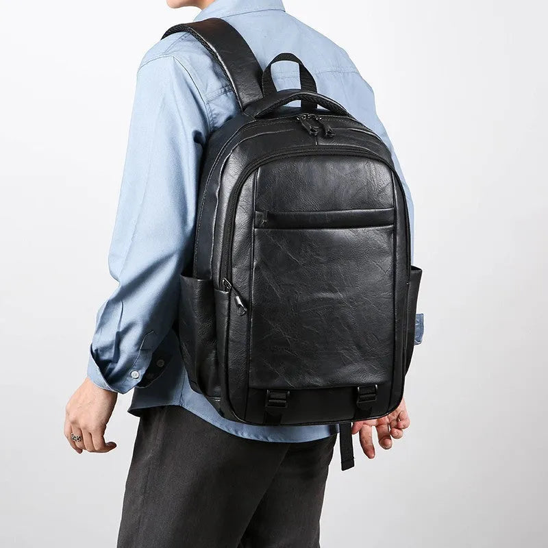 Men's large capacity leisure backpack in khaki, PU material, curved shoulder strap, 47x33x18cm