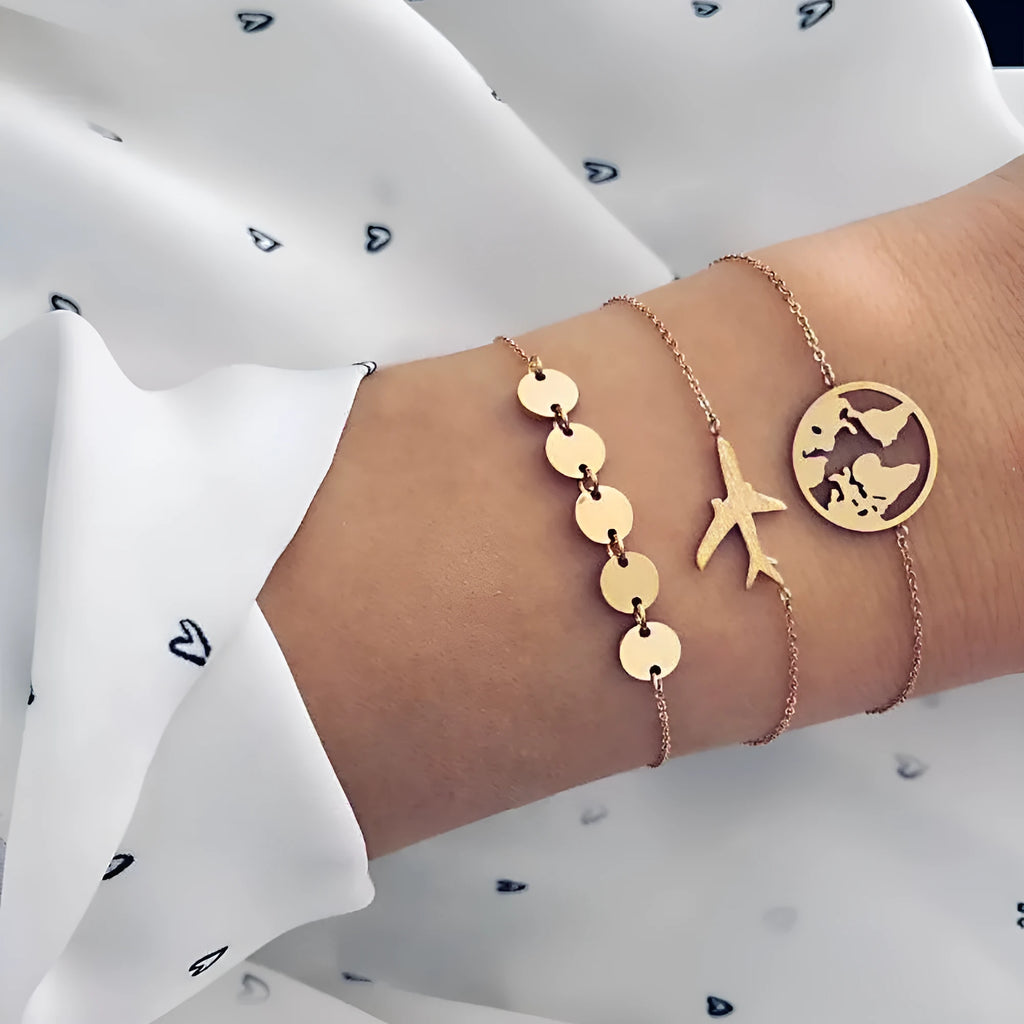 Three bohemian bracelets with aircraft map charm pendants in heart shape design