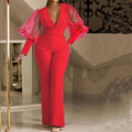Mesh stitching long sleeve jumpsuit with elastic waist and wide legs in polyester fabric