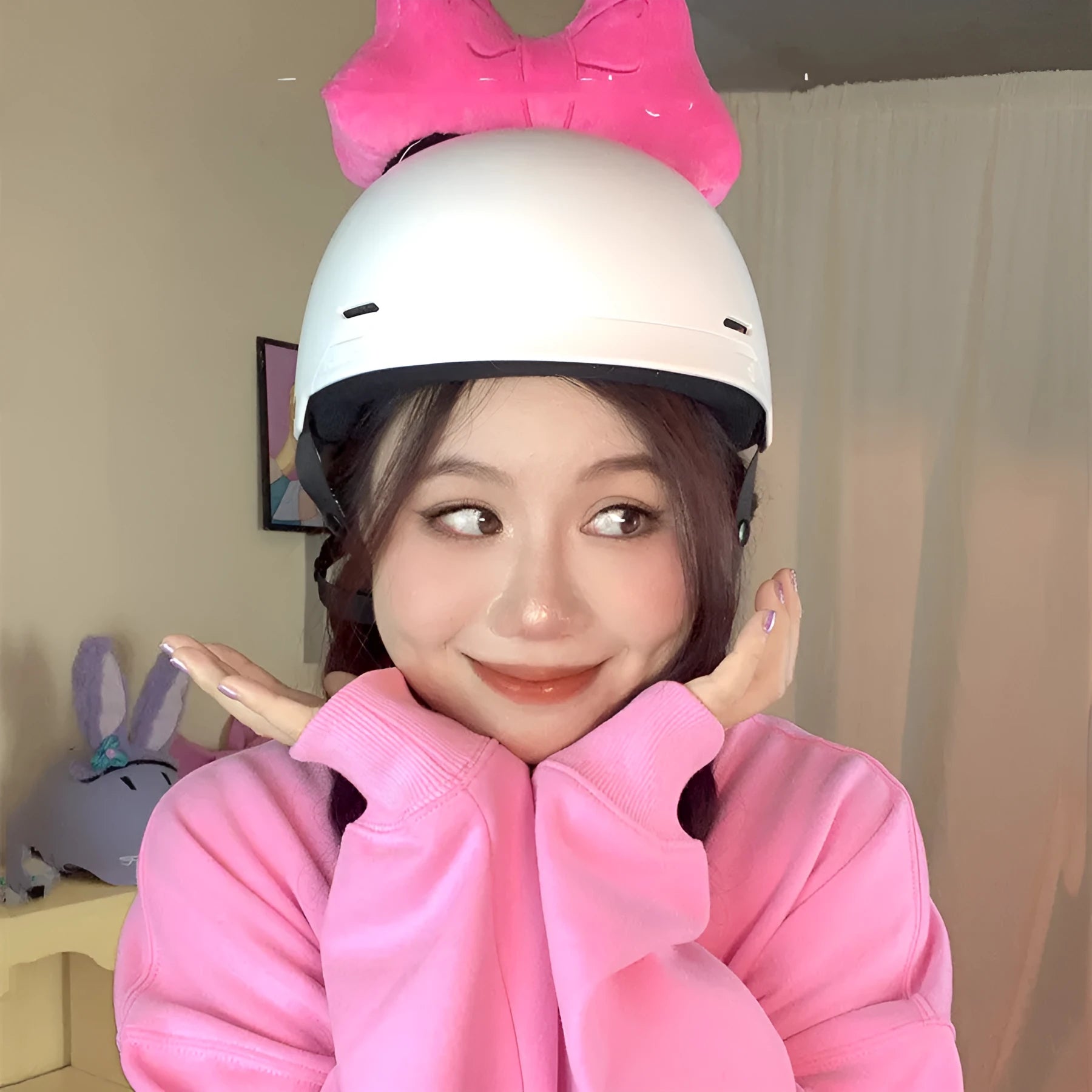 Plush bow helmet decoration in red, pink, and rose pink colours for motorcycle and ski helmets