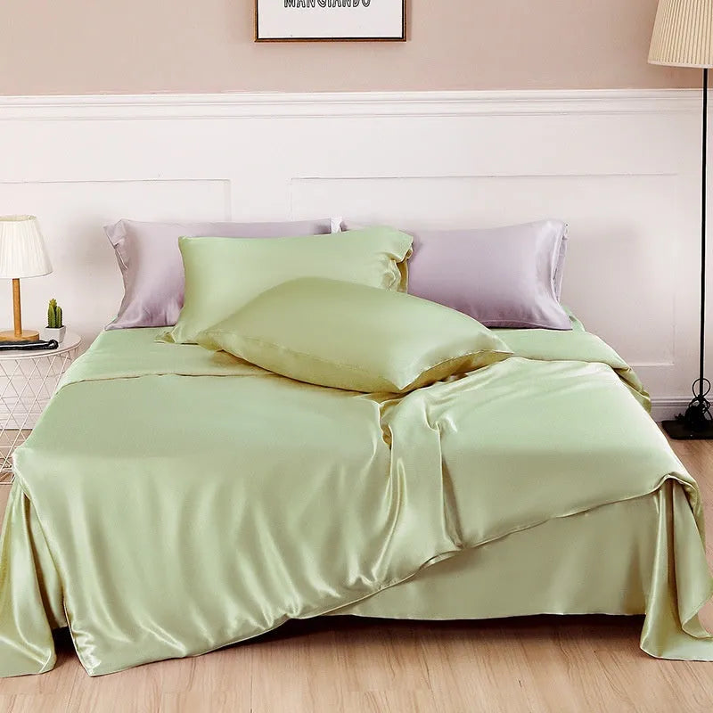 Solid colour double-sided silk duvet cover shown in bright brown, with other colour swatches for Lotus Pink, pea green, mysterious purple, white, and silver blue.