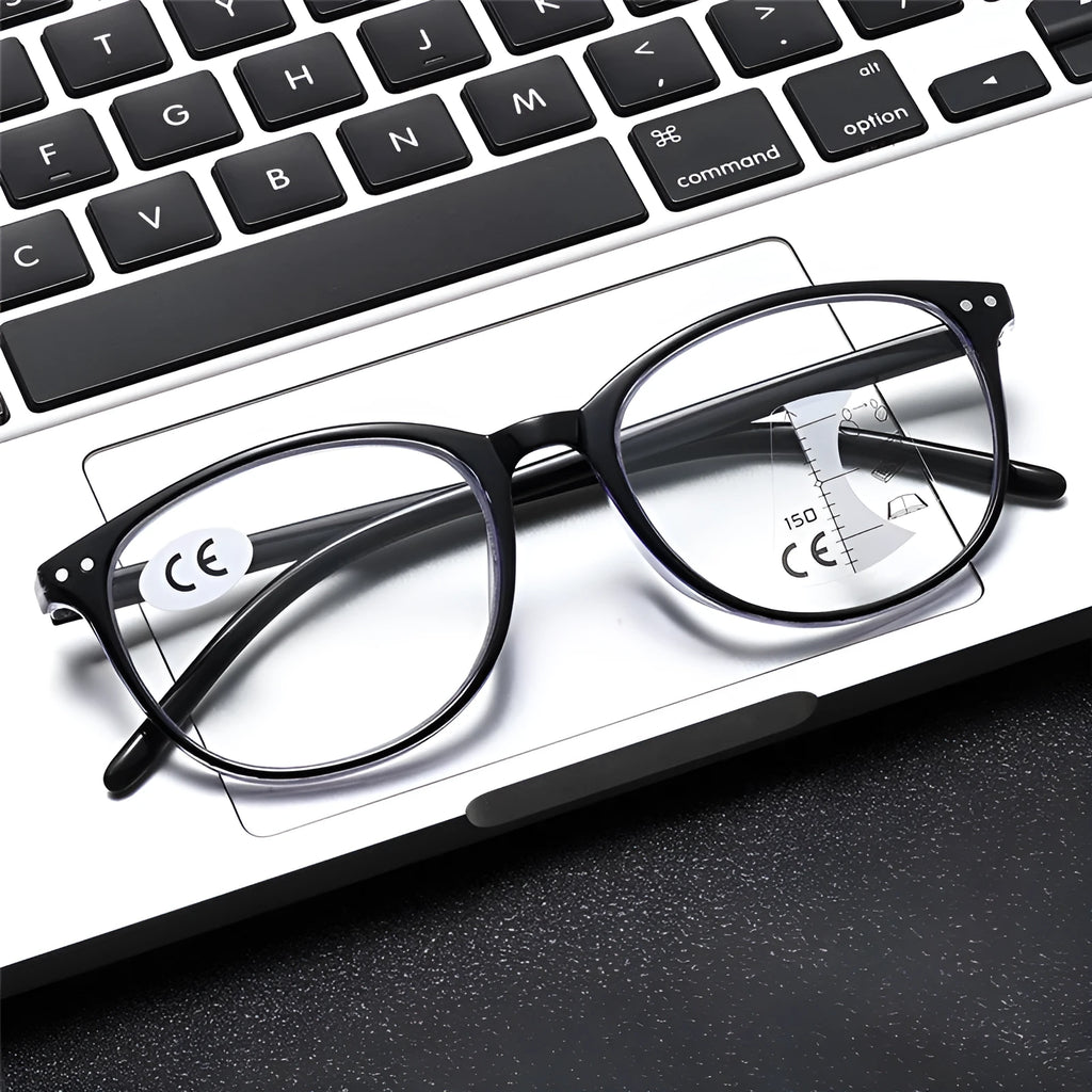 Women's ultra-light multi-focus presbyopic glasses in black and blue focus frame colour on a table.