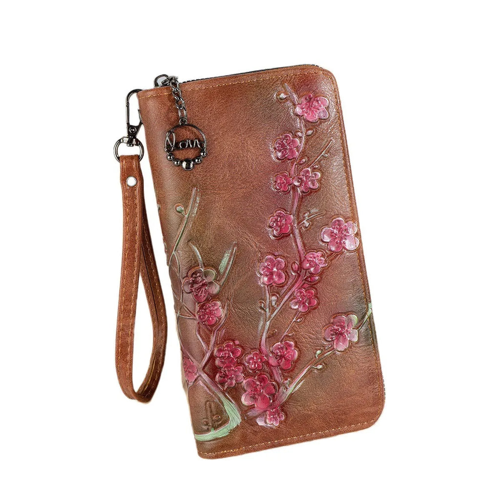 Embossed floral Chinese style handbag in black with zipper closure