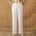 Navy blue linen straight-leg trousers with a high elasticated lace waistband on a hanger.