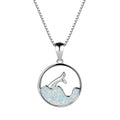White gold electroplated geometric fishtail necklace pendant with a round blue opal stone.