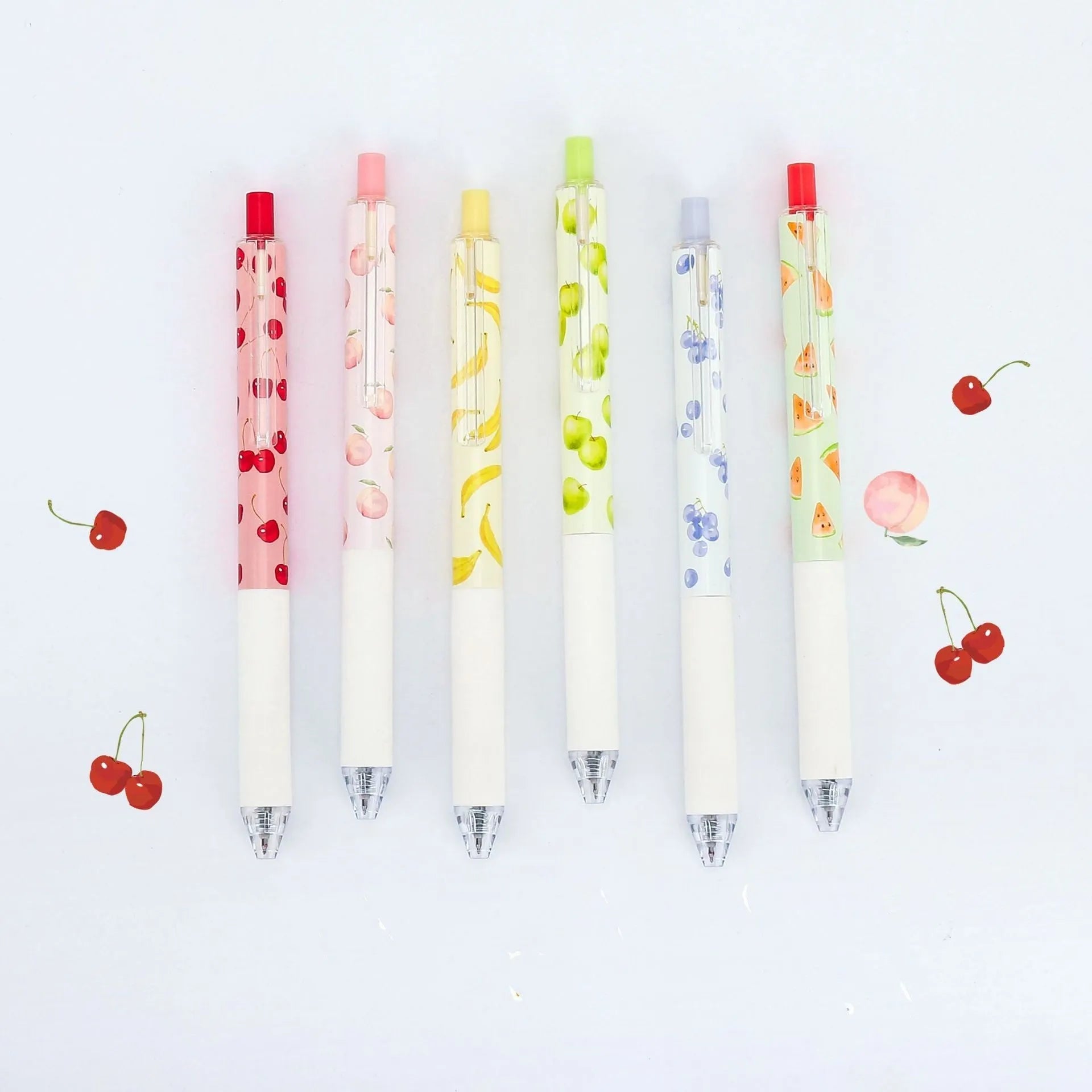 Three scented fruit flavoured pressurised pens with 0.5mm black ink and plastic barrels