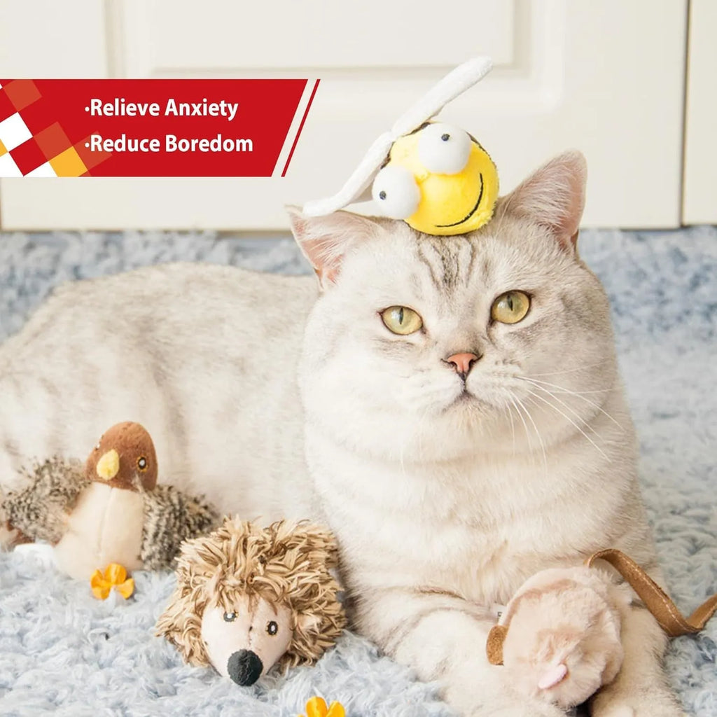 Yellow bee-shaped electronic cat toy with flannelette fabric on wooden surface