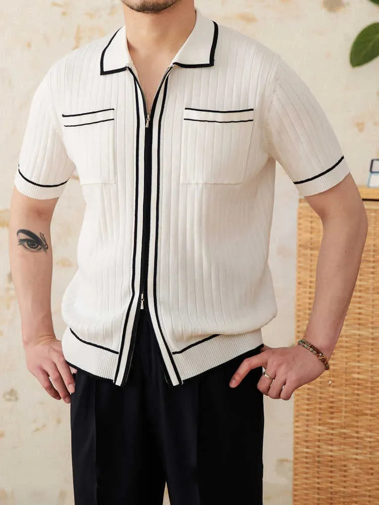 Slim fit lapel collar short-sleeved polo shirt in black, laid flat.