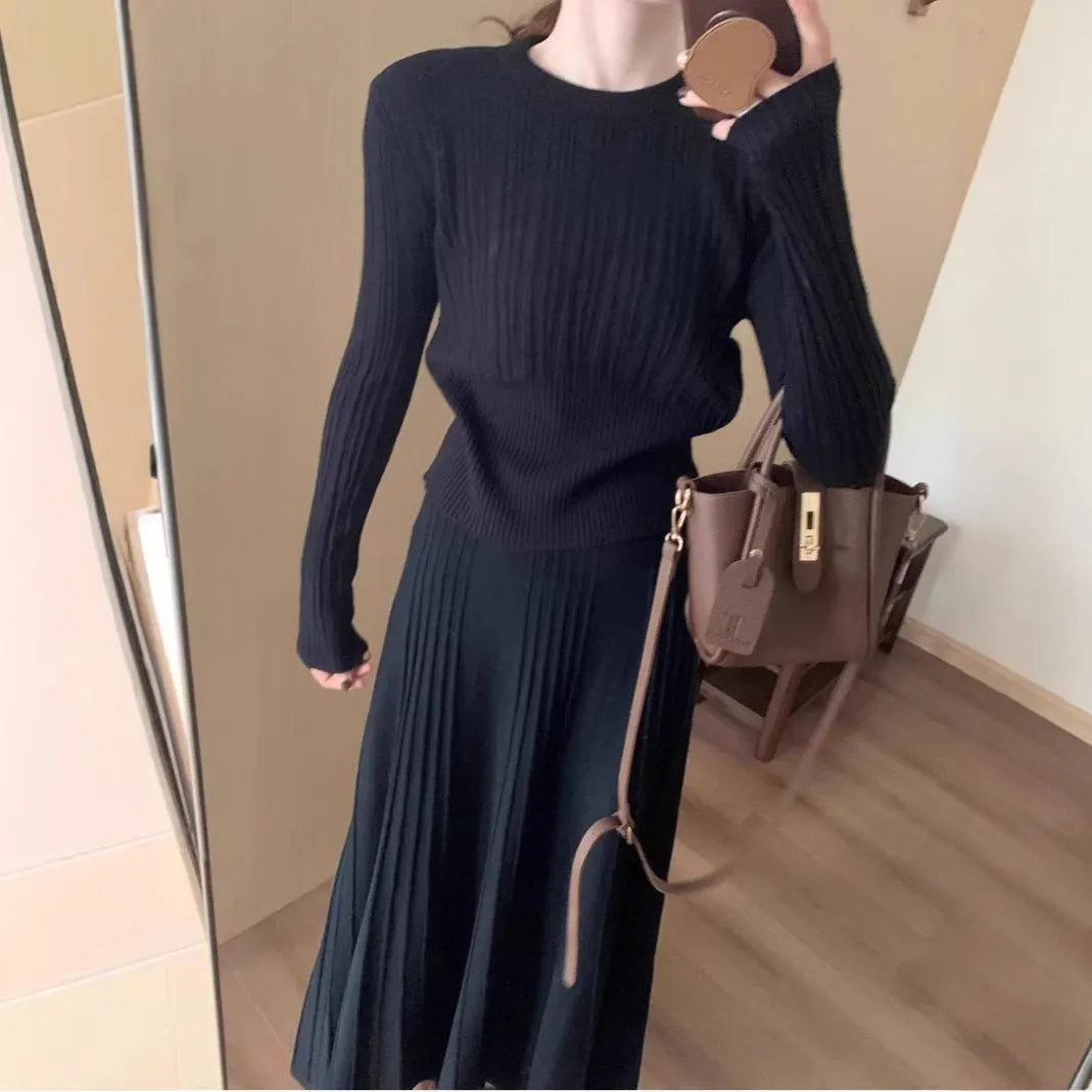 Women's dark grey knitted long dress suit set with 3D pattern, featuring a sweater and skirt in artistic retro style.