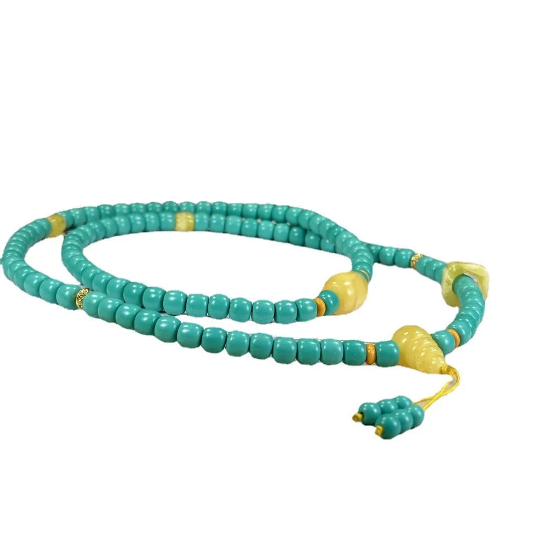 Hand-woven turquoise mesh flower pendant necklace on ball bead chain with adjustable length