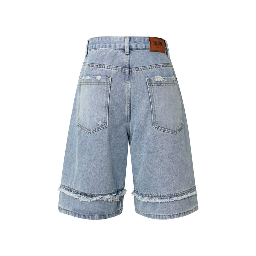 Men's distressed raw edge denim shorts in straight leg cropped style, shown in black