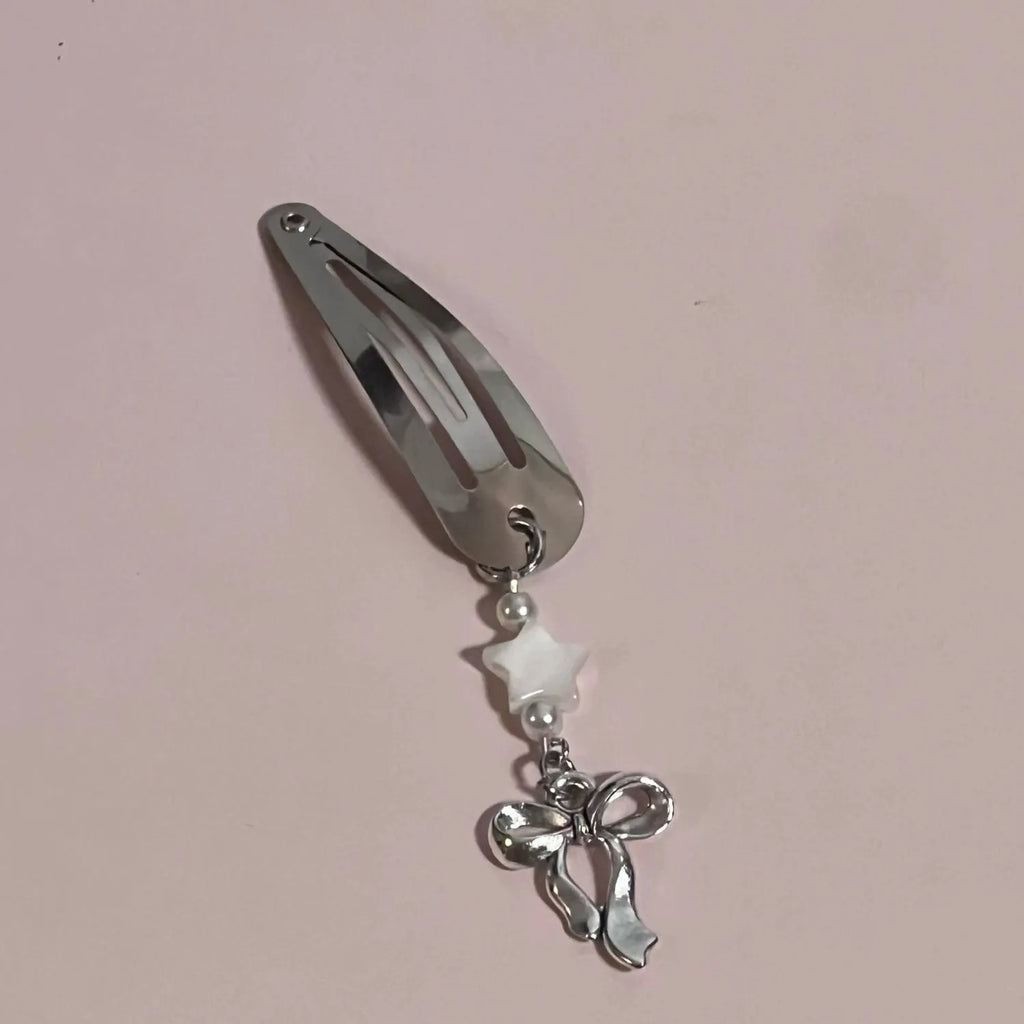 Silver star bow metal hair clip with electroplated finish, single pack