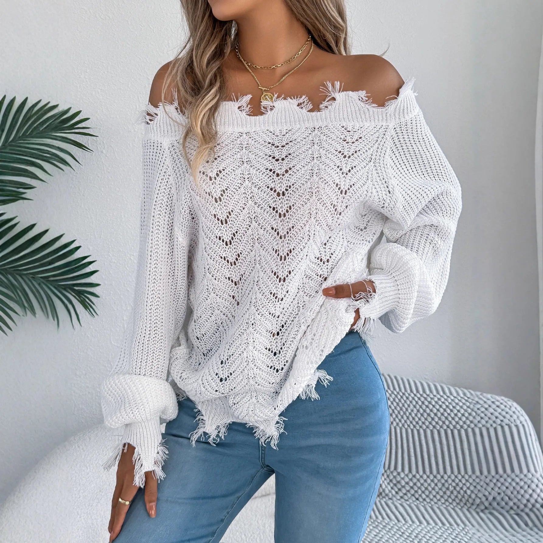 Hollow-out long-sleeved pullover sweater with off-the-shoulder neckline in black colour