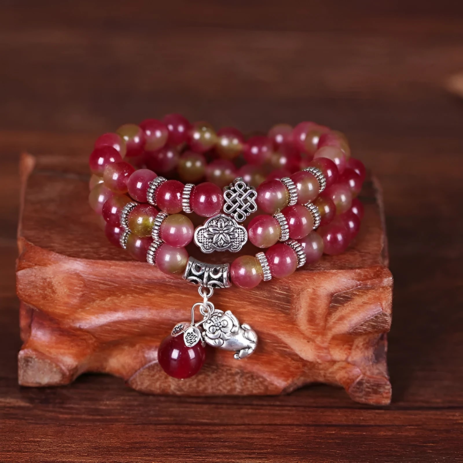 Handcrafted watermelon crystal bracelet with Chinese knot design in geometric shapes