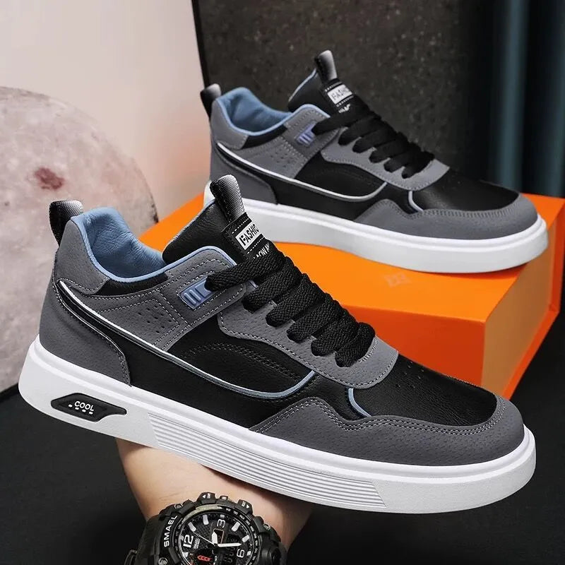 Men's Korean-style low top canvas board shoes in black with leather stitching detail on a white background.