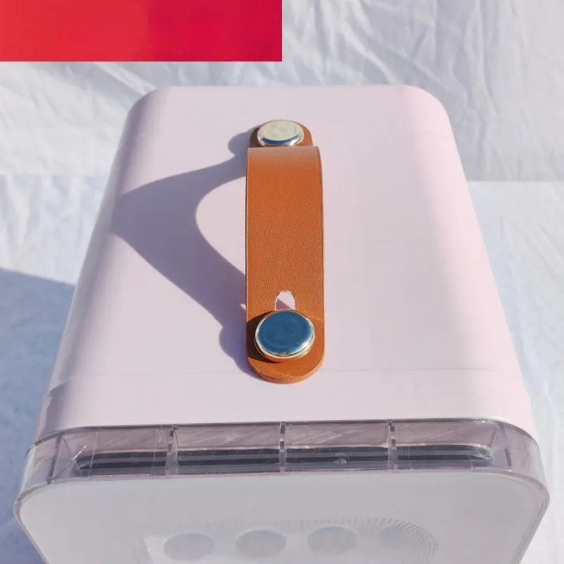 Pink mini refrigerator with transparent door showing dual hot and cold functionality for car and home use