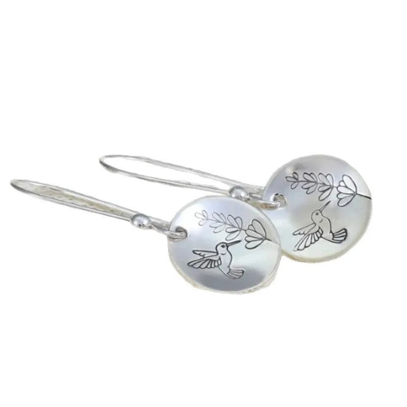 Silver colour women's earrings with bird, flower and leaf designs in round zinc alloy construction