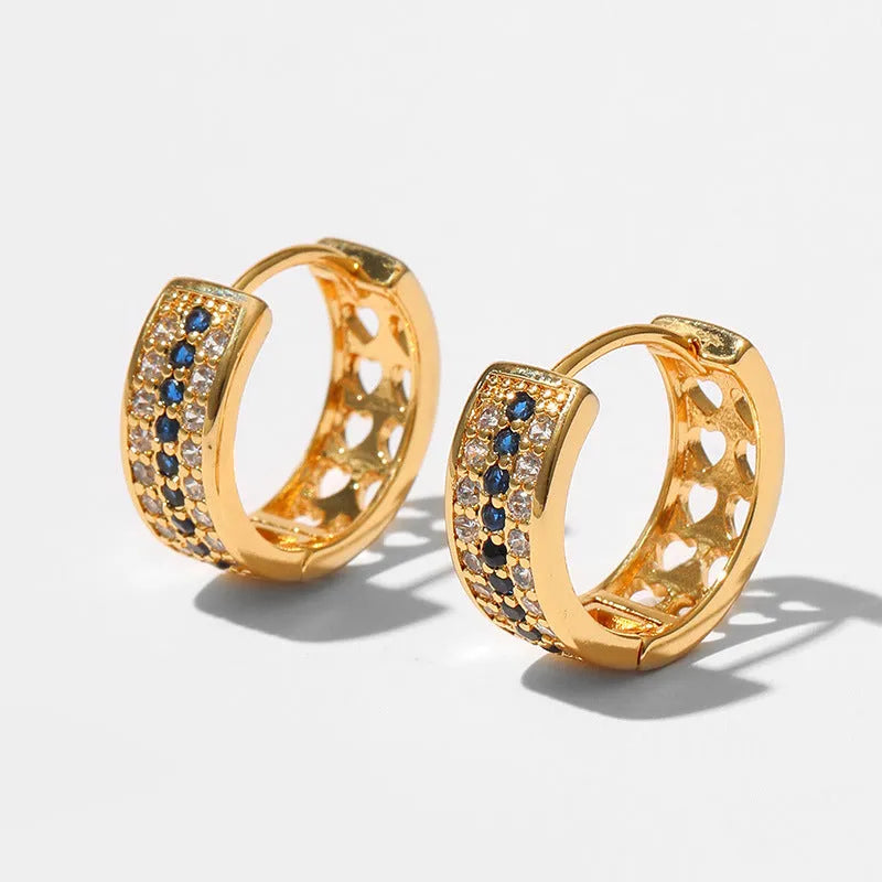 Women's round geometry earrings with 18K electroplated gold finish on copper