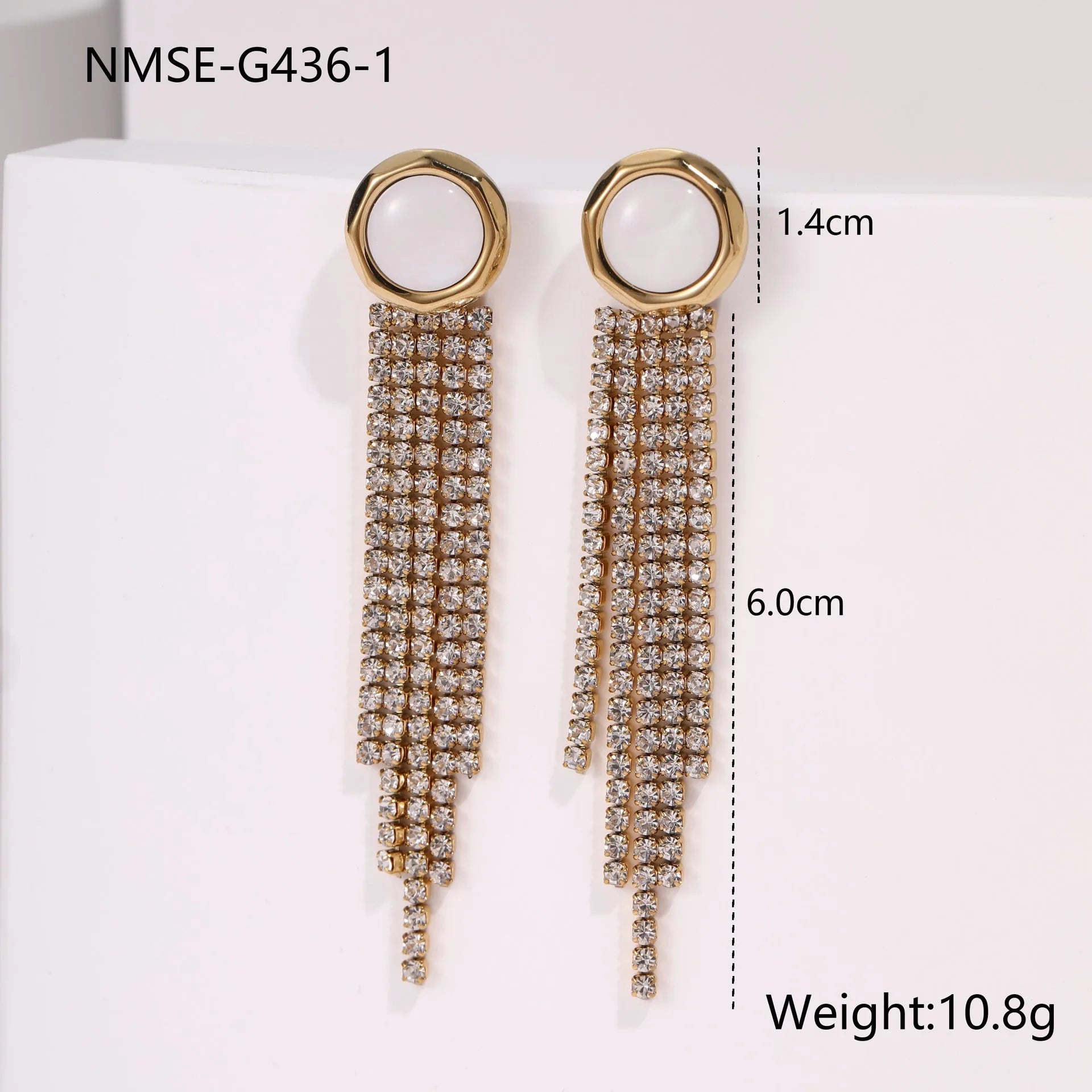 Pair of 18K gold plated stainless steel earrings featuring heart and star shapes with diamond tassels