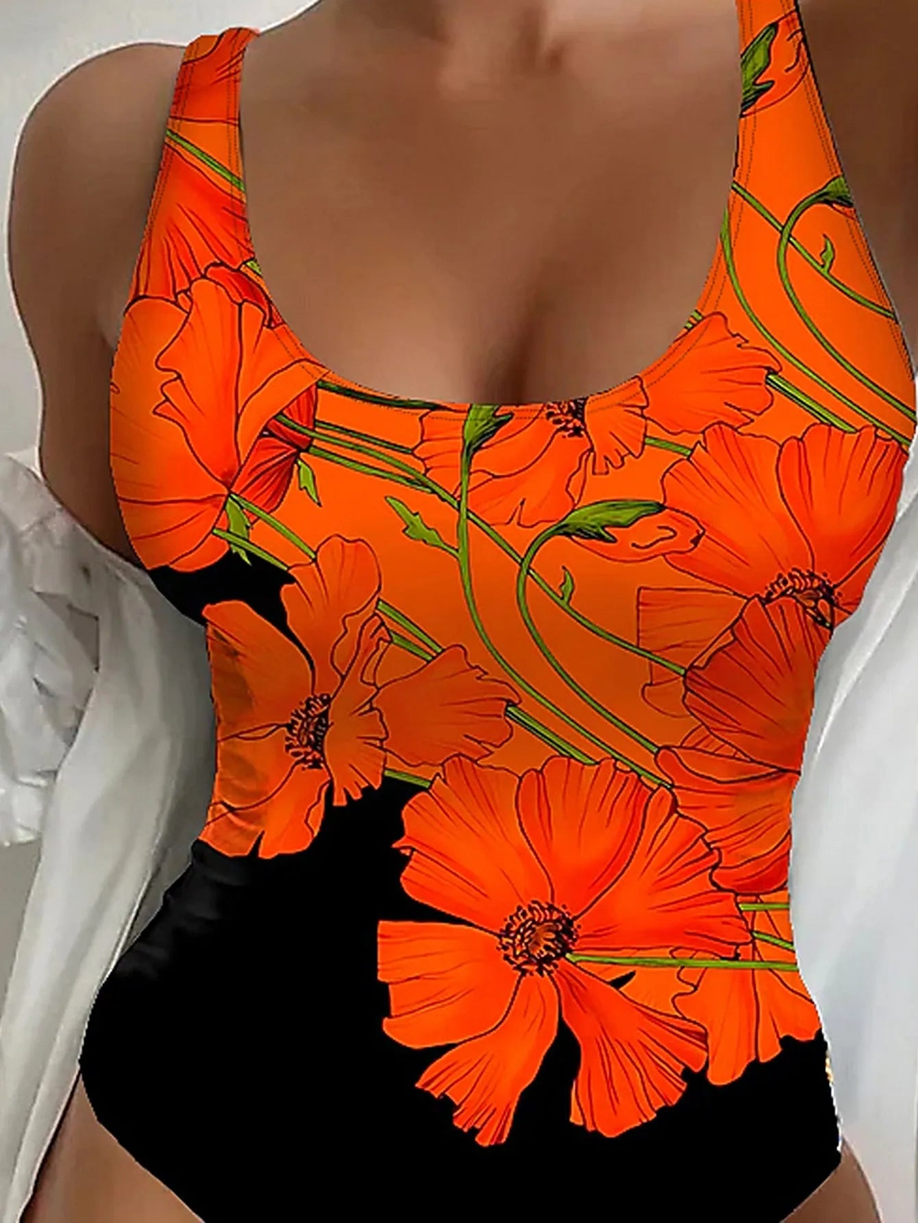 Orange flowers printed one-piece swimsuit with a backless design and slim fit.