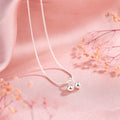 Silver cherry pendant necklace with adjustable snake bone chain on a 21cm to 50cm range.