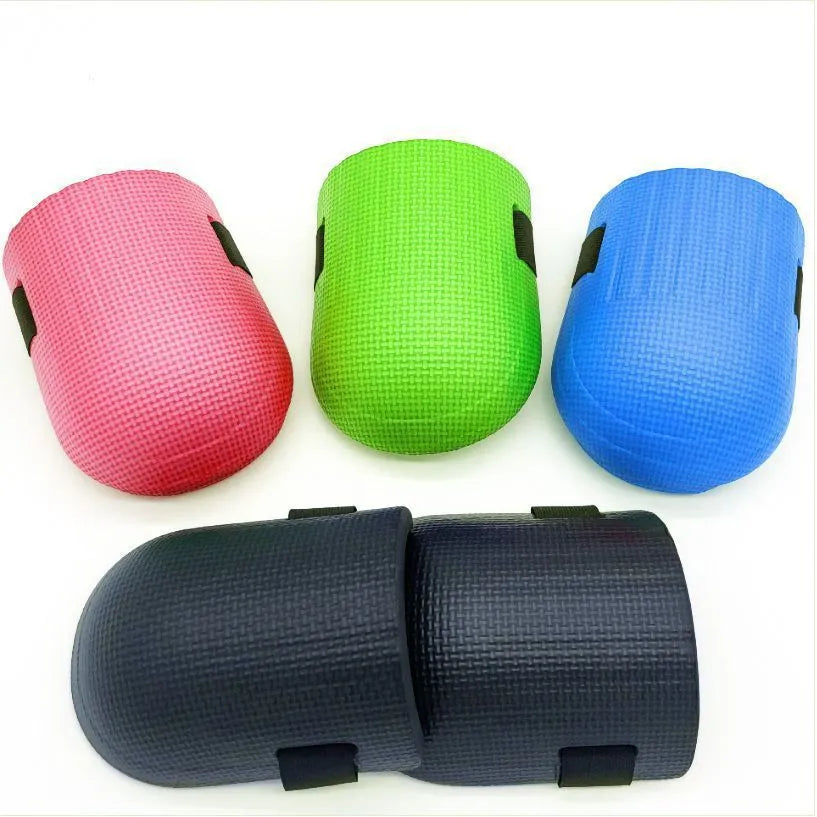 A pair of thick EVA foam kneepads in various colours for work and DIY kneeling protection.