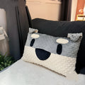 Grey and white West Highland puppy design dog pillow on a sofa, showing soft fabric and 50cm size.