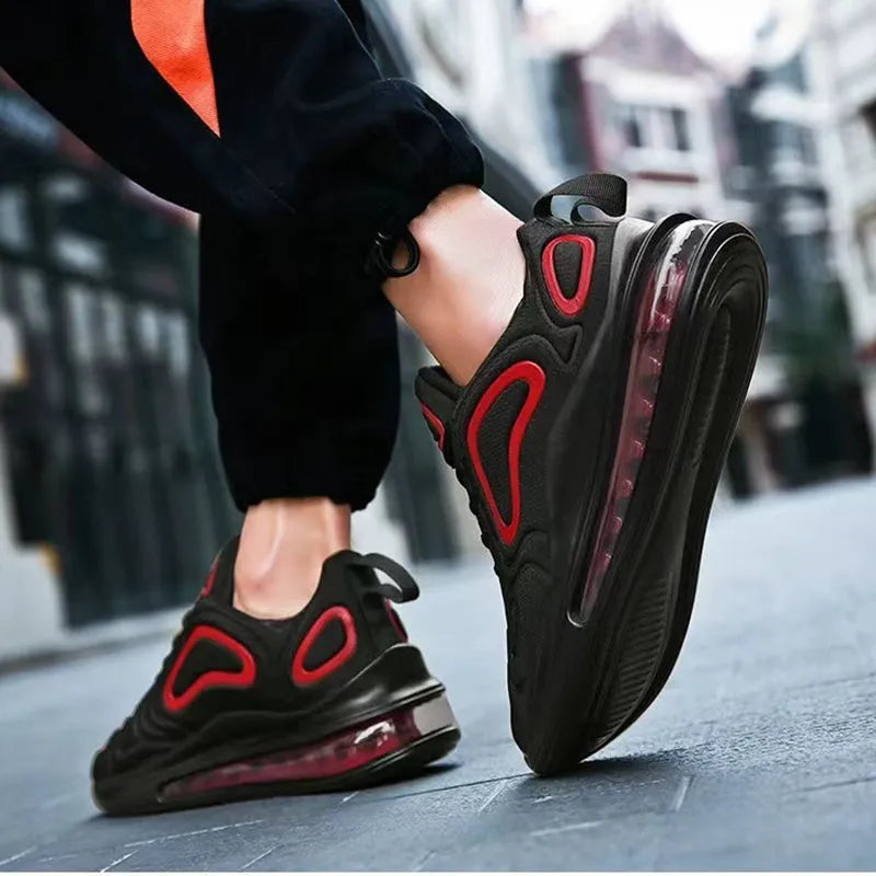 Men's black casual sneakers with lace-up front, thick sole, and round toe for running and outdoor sports.
