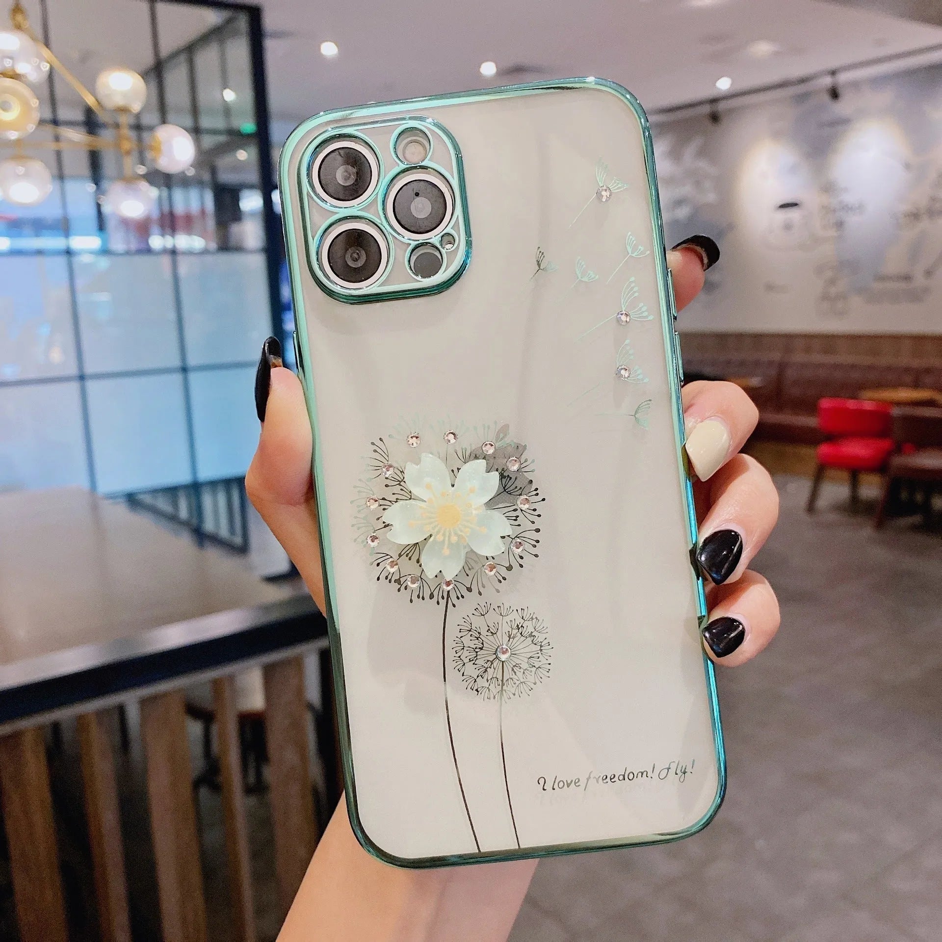 Silicone iPhone case with a spinning 3D flower stand on the back in rose gold colour