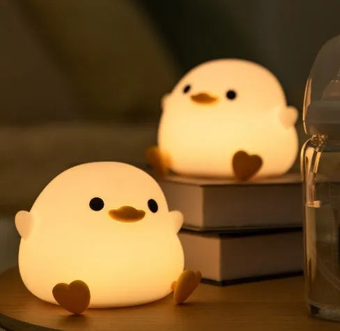 Seagull silicone night light in yellow with soft warm glow, compact size fits nursery bedside