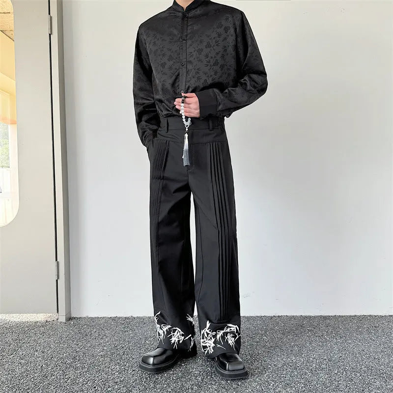 Pleated wide leg straight pants black cotton blend with elastic waist on mannequin