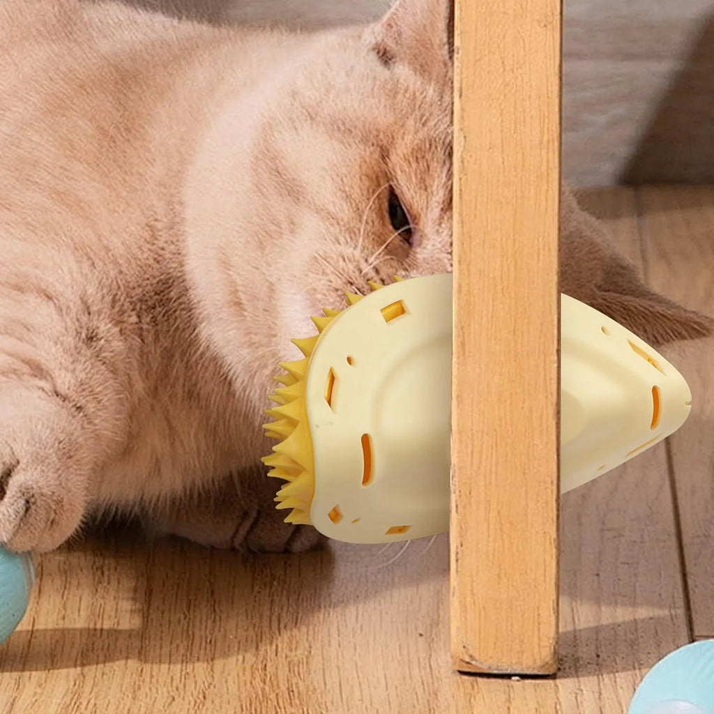 Yellow durian-shaped cat corner scratcher and massage comb mounted on a wall