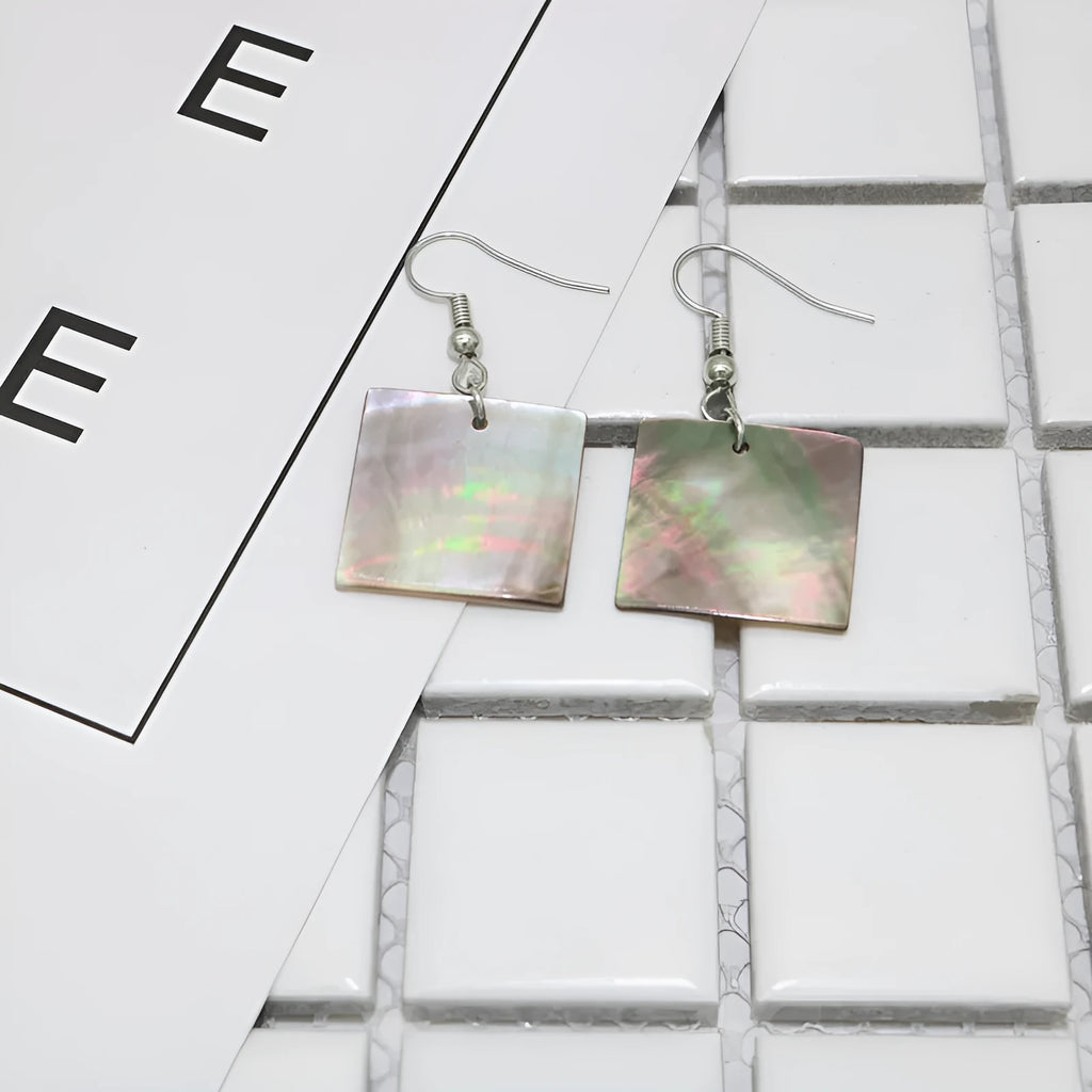 Geometric drop earrings made from natural shell in Square Panther or Rectangular Shell colour options.
