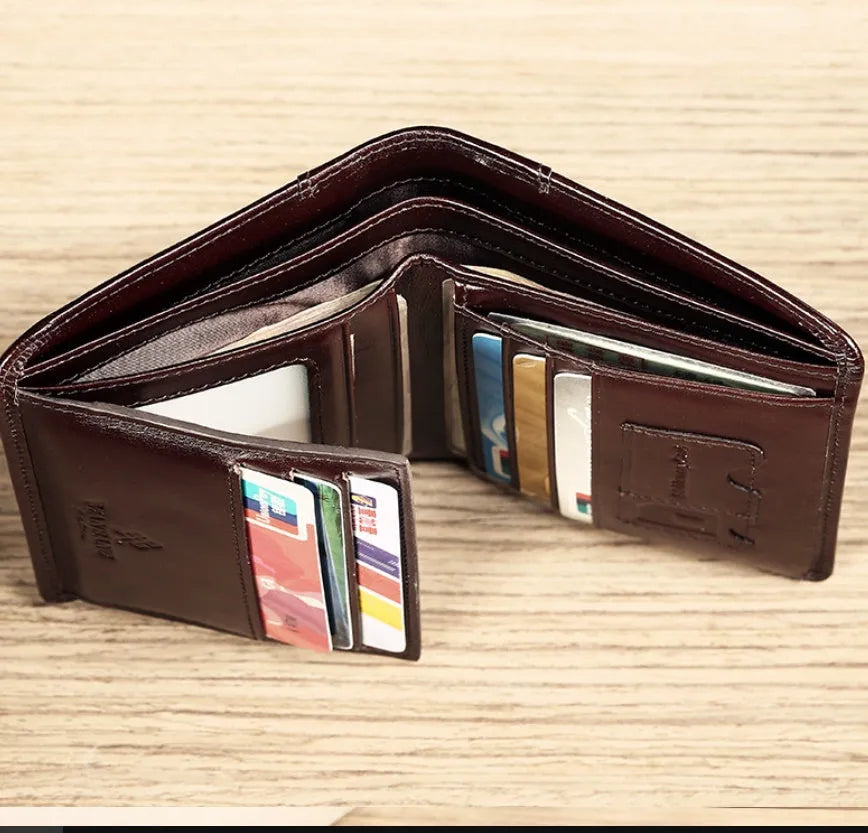 Men's leather wallet showing multiple compartments including banknote folder and card slots