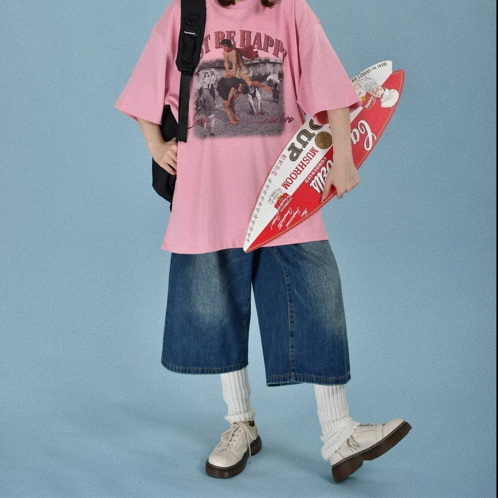 Man wearing loose straight-cut blue jeans shorts made from Trueran denim fabric.